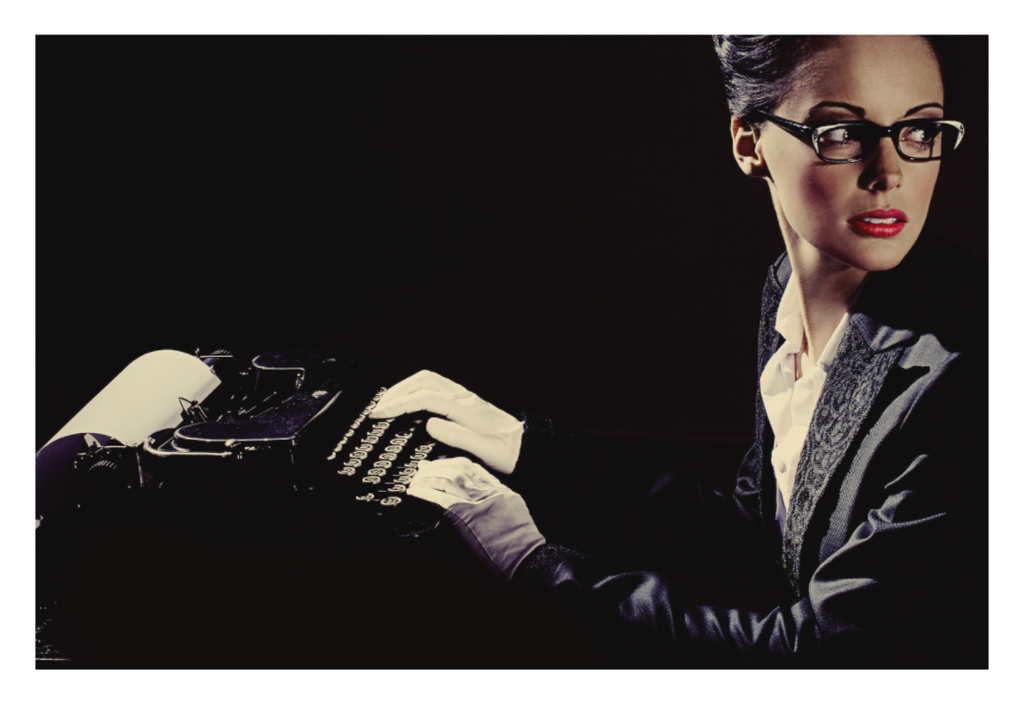 Overtime fine art photograph by LiAns JadAn featuring a secretary in glasses seated at a vintage typewriter and looking off-frame