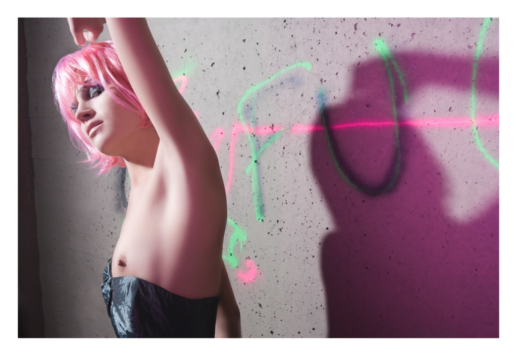 Pink Static fine art fashion photograph by LiAns JadAn featuring vivid pink styling, fluorescent graffiti, and raw concrete