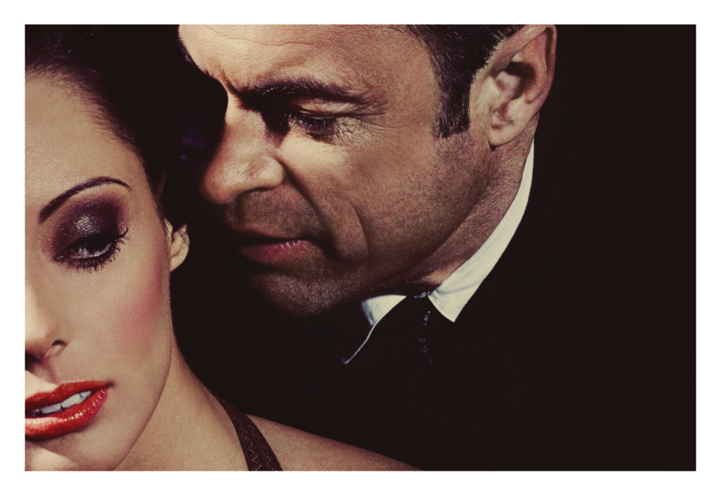 Terms of Employment fine art photograph by LiAns JadAn featuring a secretary and her employer in an intimate close portrait with dramatic noir lighting